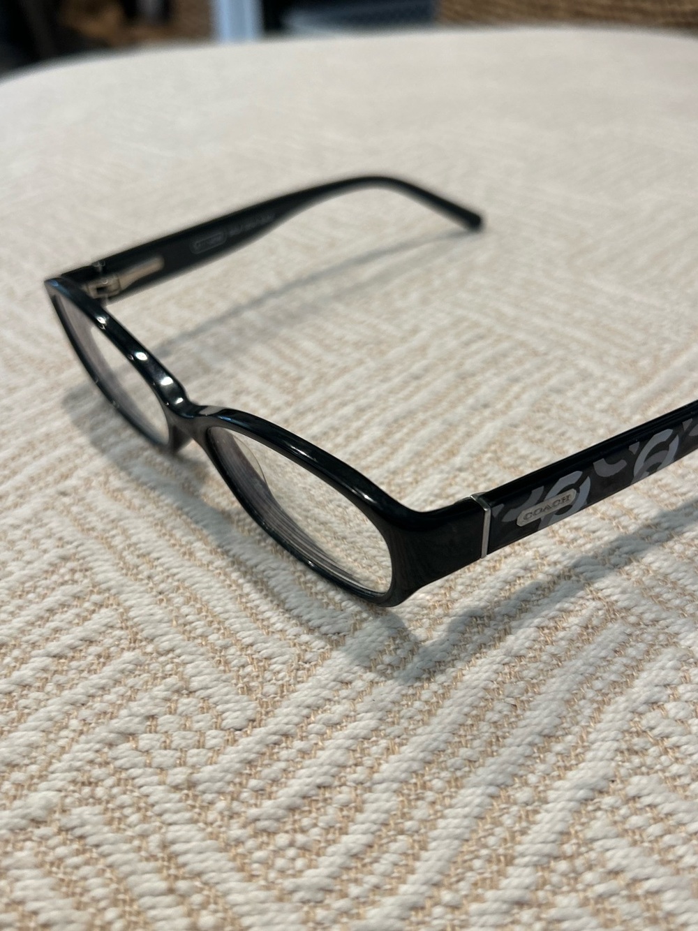 Coach Baila (2034) Black Glasses. White and grey C design. Coach logo. Luxury